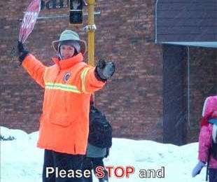 Crossing Guards Assisting Children