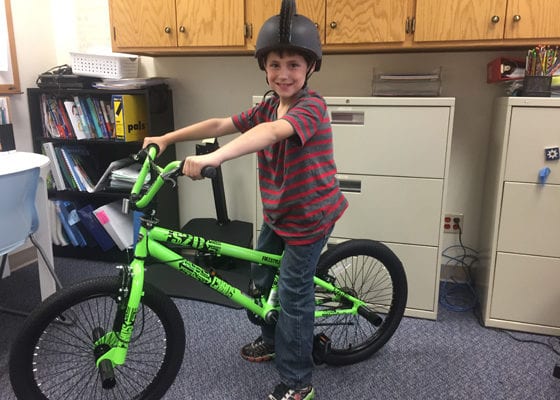 Gavin Lambert won a bike at the Bryant Smart Start Day | School District of Superior