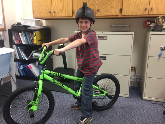 Gavin Lambert won a bike at the Bryant Smart Start Day | School District of Superior