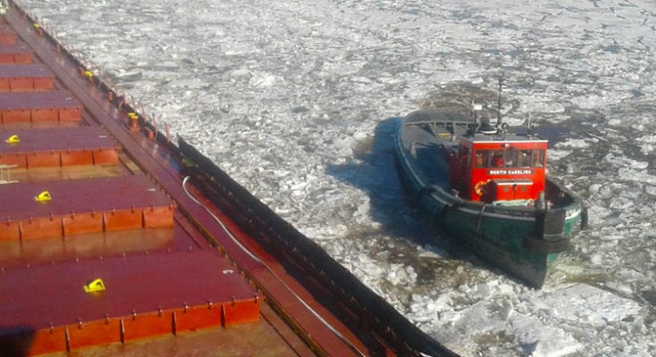 Tug Boat "North Carolina" breaking ice as the Kaye E. Barker began her journey to the Soo Locks